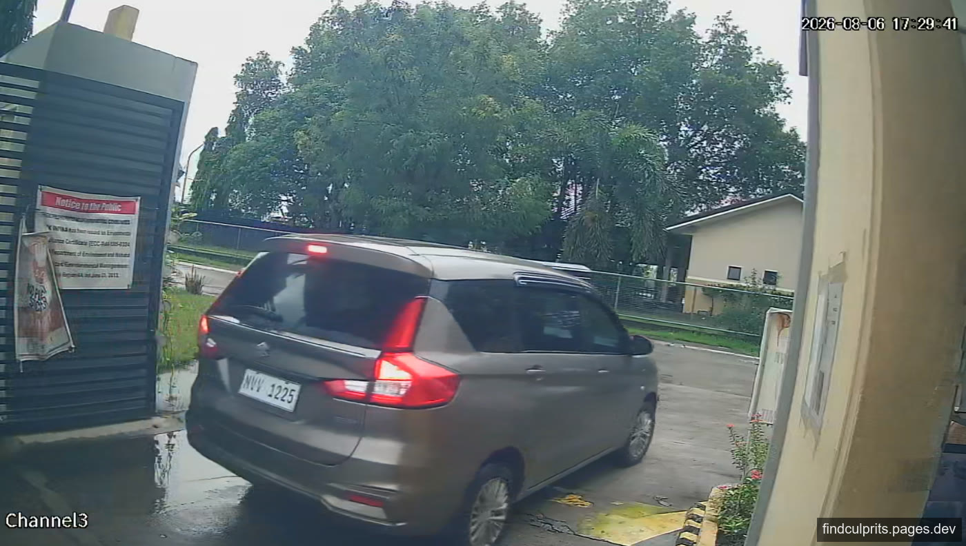 A Suzuki Ertiga with plate NVV 1225 leaving a subdivision gate on 6 August 2026 at 5:29 PM